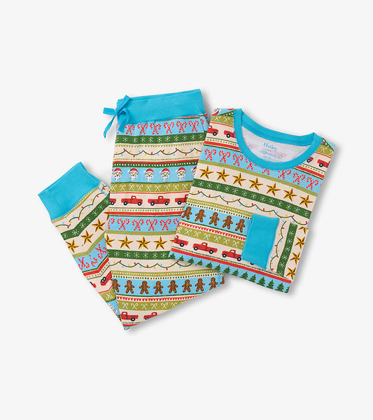 Men's blue cotton pajama set featuring a colorful Fair Isle pattern with festive motifs, including gingerbread and stars.