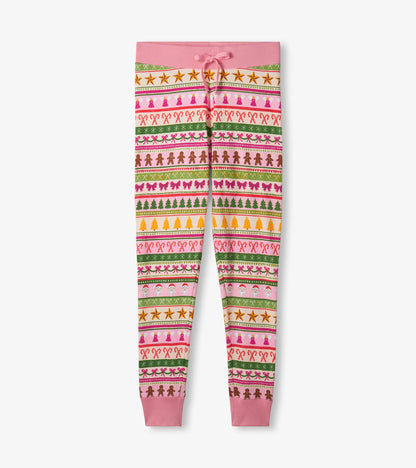 Pink cotton pajama pants featuring a colorful Fair Isle pattern with festive motifs and a drawstring waist.