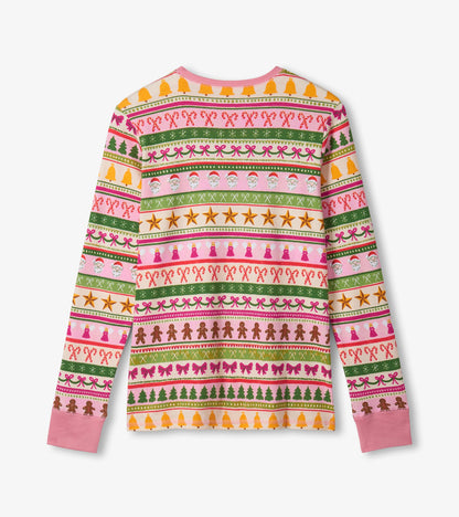 Pink cotton pajama set featuring a fun Fair Isle pattern with festive motifs like Santa, trees, and candy canes.