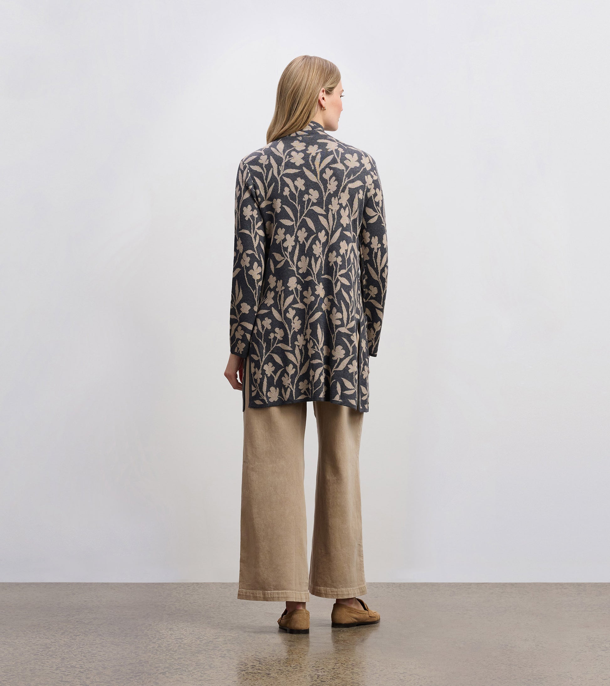 Long-sleeve sweater blazer in navy with floral vine pattern, featuring a relaxed fit and back vent detail.