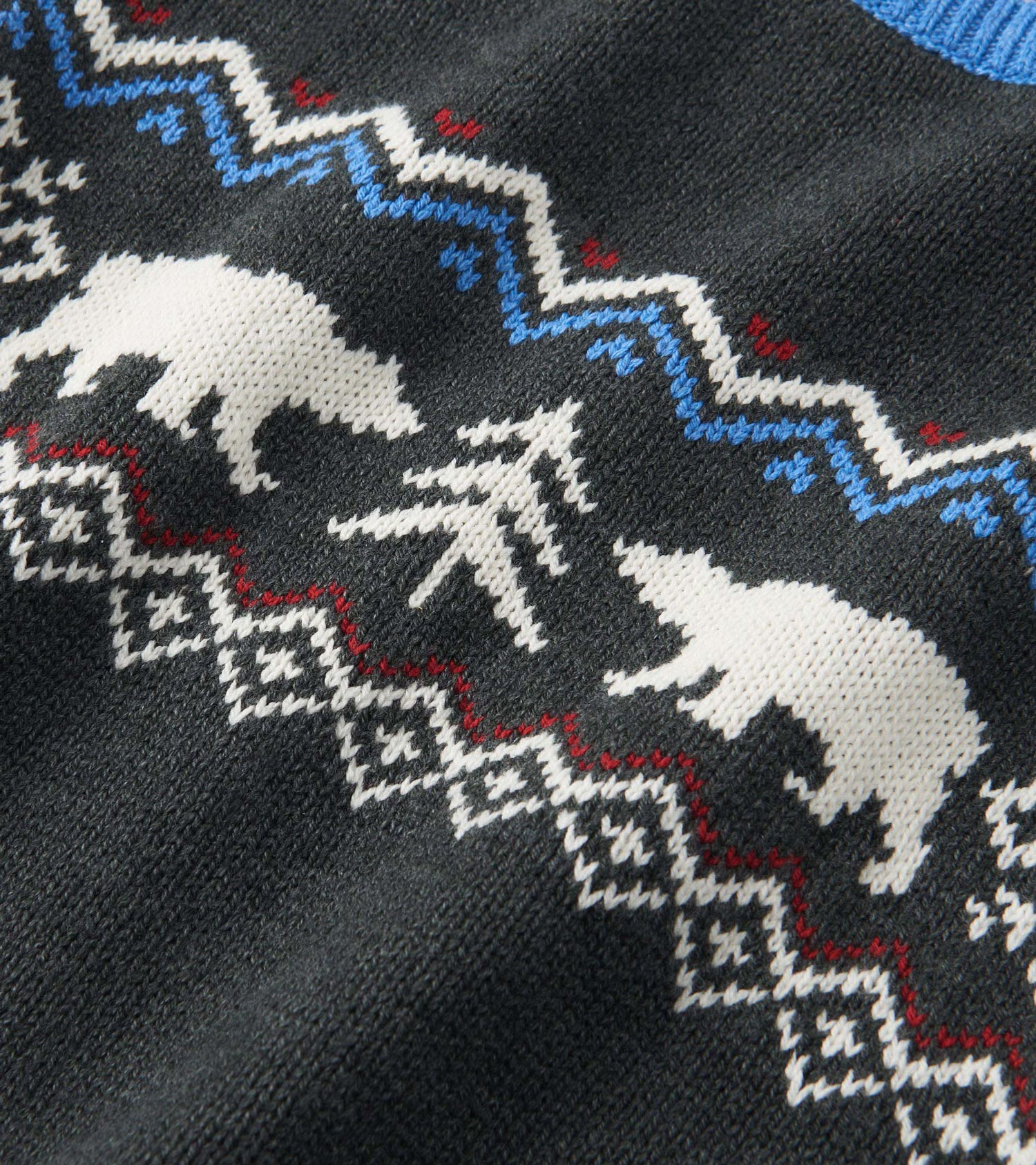Dark gray crew neck sweater featuring white bears and trees in a festive pattern. Suitable for winter wear.