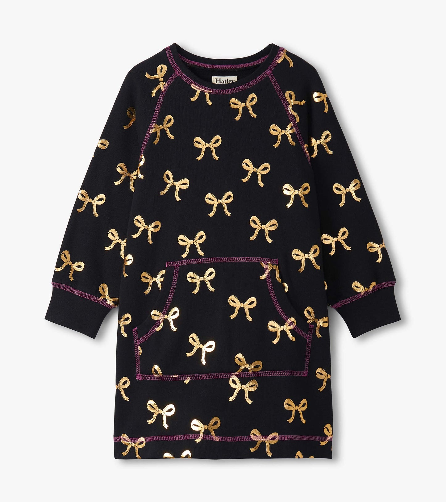 Black sweater dress featuring gold bow patterns and a front pocket, with purple stitching accents. Suitable for girls.