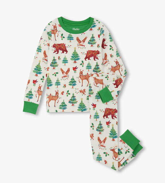Cotton pajama set featuring a holiday animal print with bears, deer, and trees, accented with green cuffs and collar.