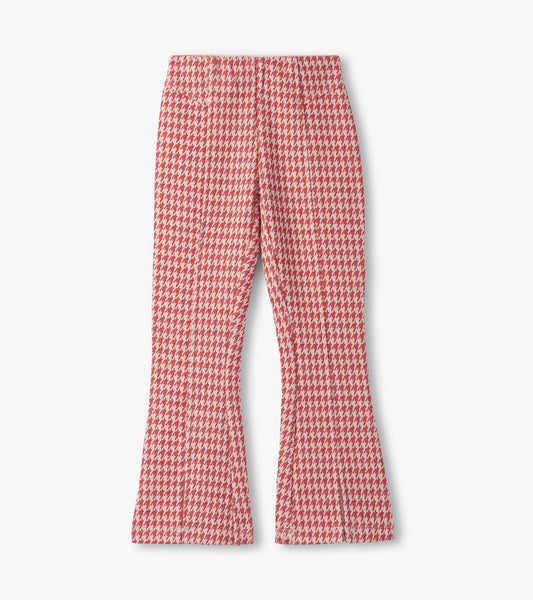 Red houndstooth bell-bottom pants with a fitted waist and flared legs, suitable for casual wear.