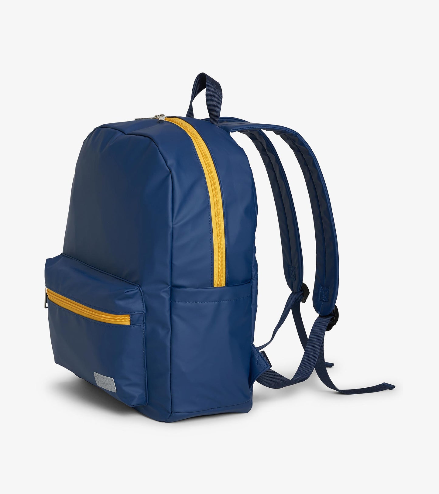 Side angle of navy backpack with yellow zipper, front pocket, top handle, and adjustable shoulder straps