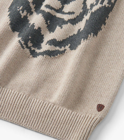 Oatmeal crew neck sweater featuring a bear design, ribbed hem, and soft knit material.