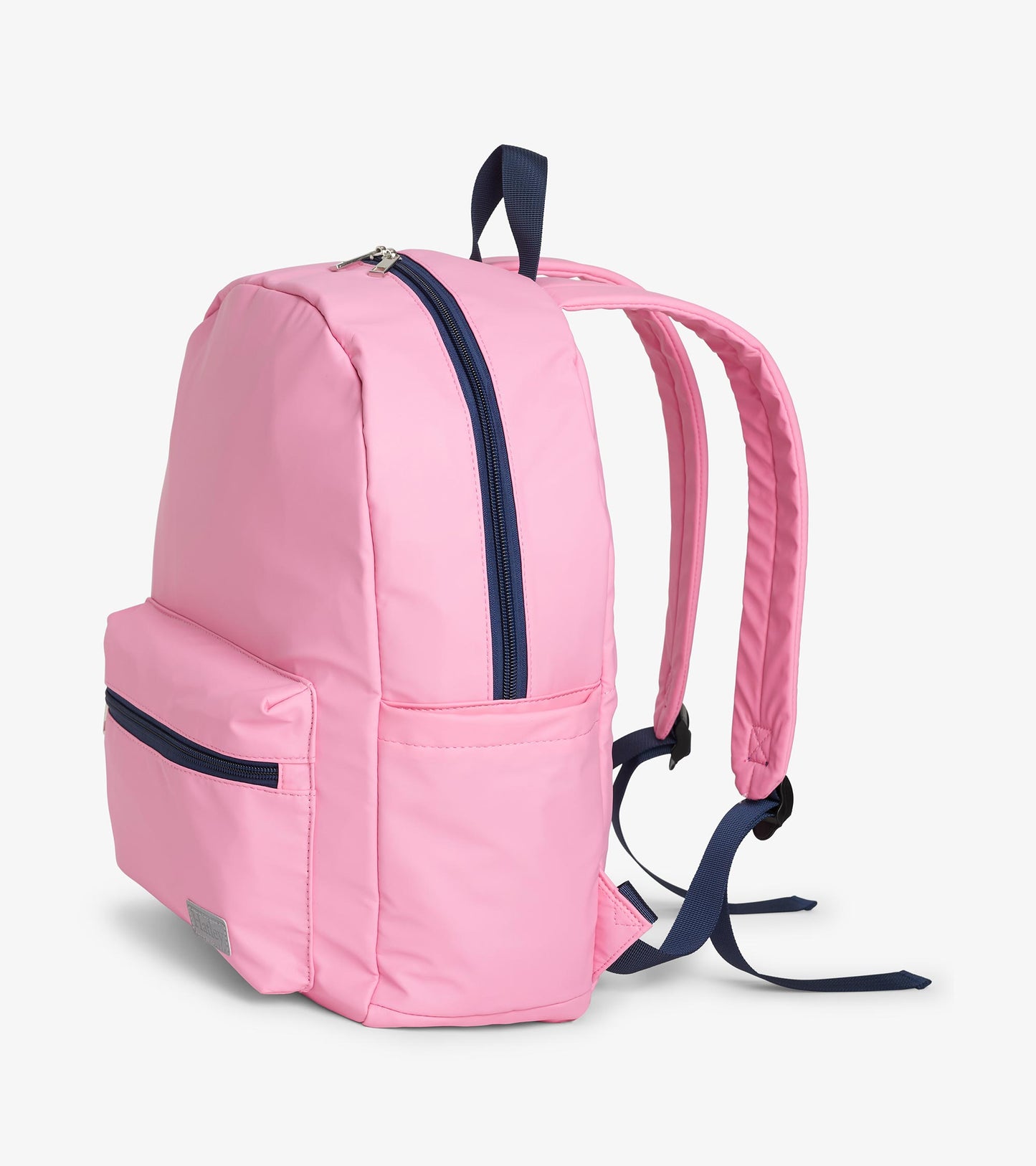 Side view of pink backpack with navy zipper, padded shoulder straps, and adjustable back straps