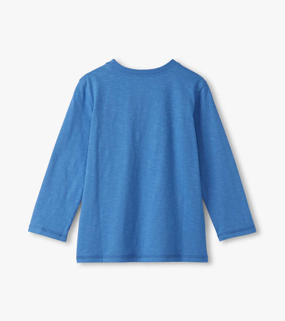 Long sleeve graphic tee in bright blue with a soft texture and a classic crew neckline.
