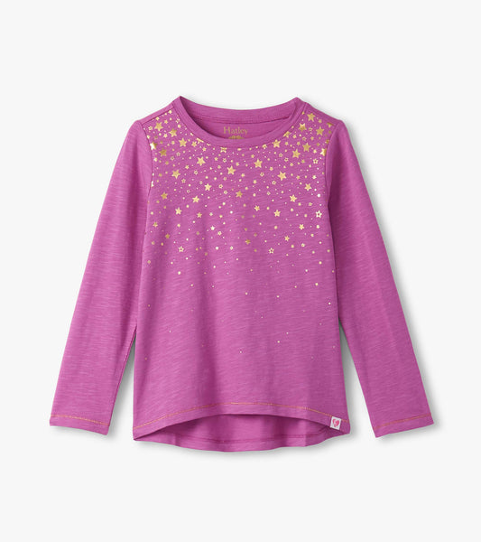 Long sleeve pink graphic tee featuring a gold star pattern on the front, made from soft, lightweight material.