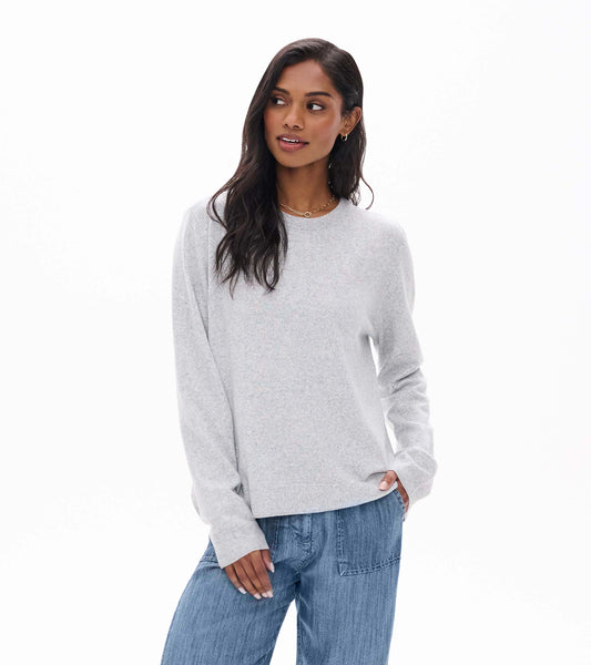 Athletic grey boyfriend sweater with crew neck and ribbed trim, shown on model from the front