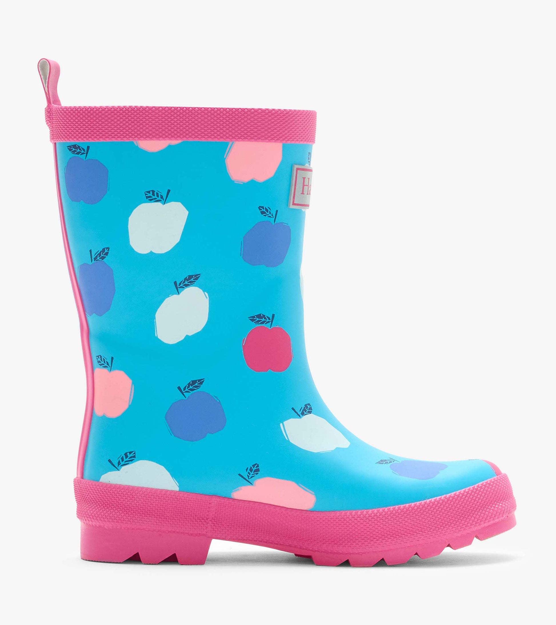 Single blue kids rain boot with pink trim and multicolor apple print, side view