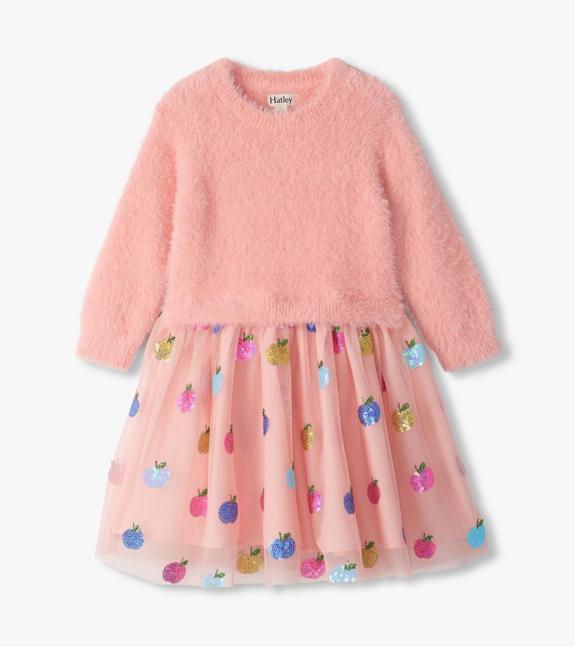 Front view of pink fuzzy mixed dress with long sleeves and tulle skirt with multicolor sequin apples