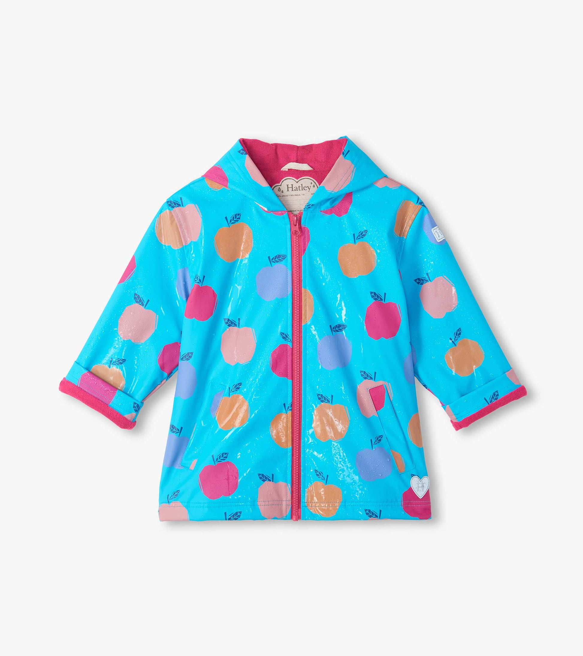 Front view of Apple Orchard colour change rain coat with wet apple print changing to peach tones