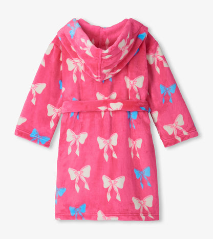 Girls pink hooded robe with white and blue bow print and tie belt, back view