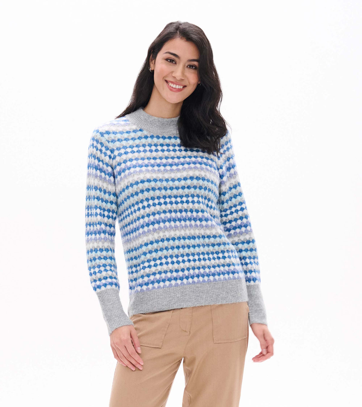 Front view of blue ombre sweater with dotted stripe pattern, gray mock neck, cuffs and hem