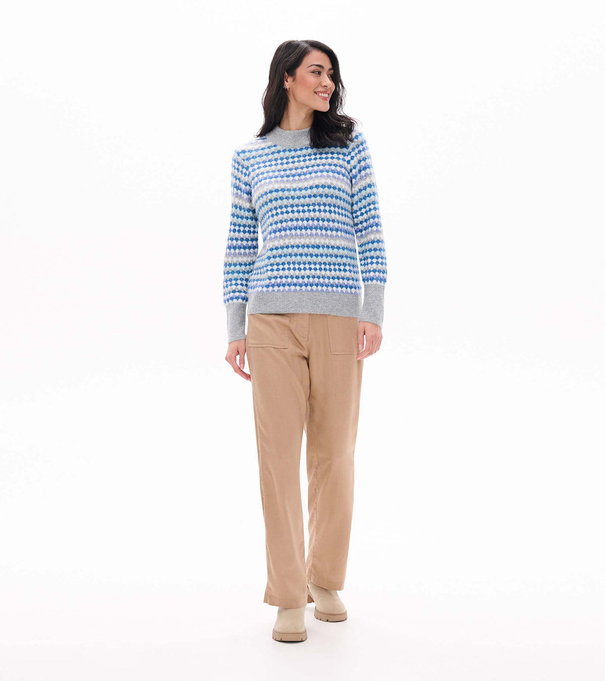 Full front view of blue ombre sweater with dotted stripe pattern and gray trim
