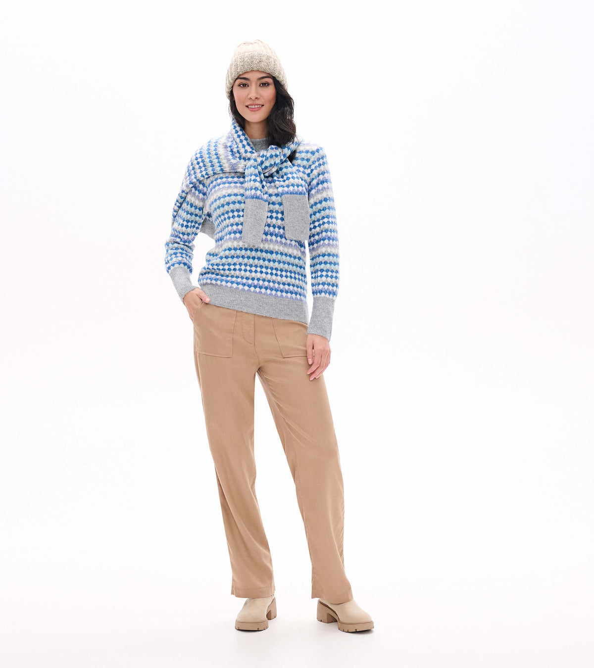 Front view of blue ombre sweater with gray trim and matching scarf draped over the shoulders