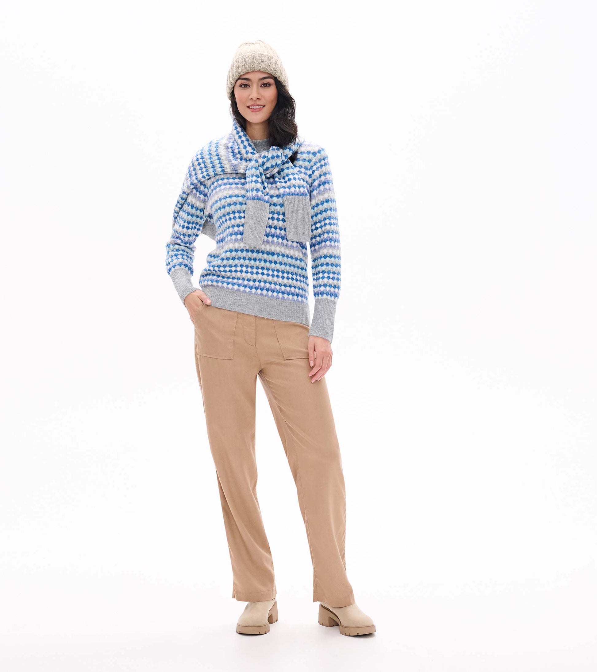 Front view of blue ombre sweater with gray trim and matching scarf draped over the shoulders