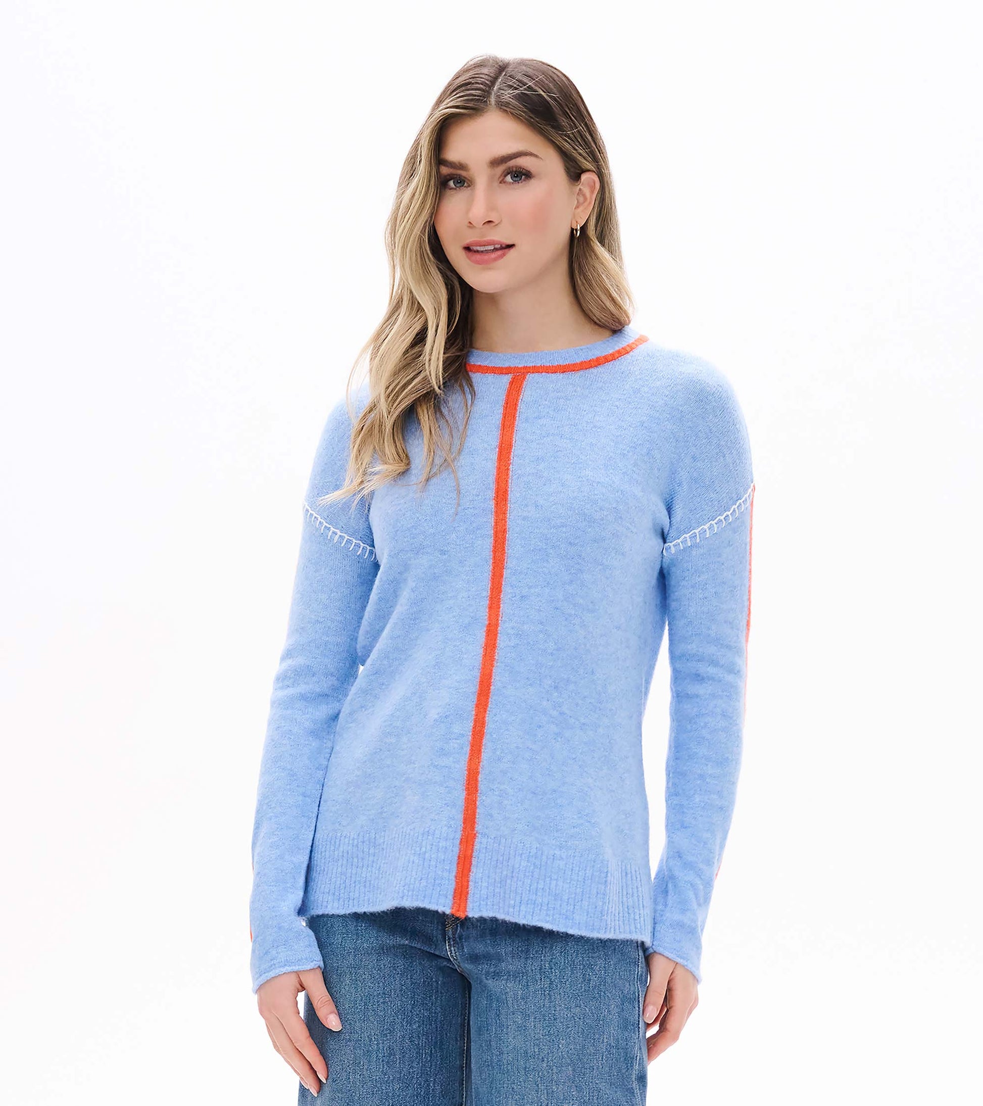 Maeve sweater in azure blue with orange center and neckline trim, front view on model