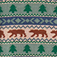 Pattern with green trees, brown moose, blue zigzag stripes, and star motifs