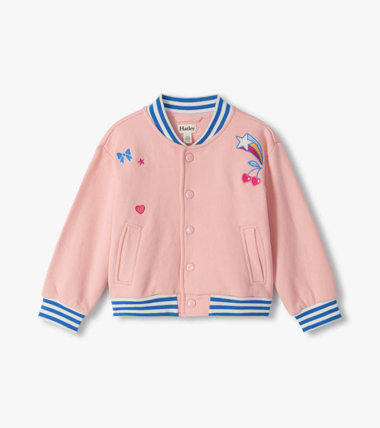 Front view of pink varsity bomber jacket with blue striped trim, snap buttons, pockets, and heart and star patches