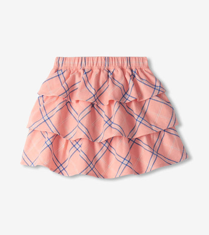 Close-up of the skirt waistband and top ruffle in blossom pink plaid