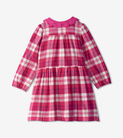 Back view of girls pink plaid long-sleeve dress with gathered skirt and bright pink crocheted collar