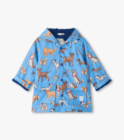 Front view of kids blue snap rain coat with hood, dog print, blue lining, and two front flap pockets