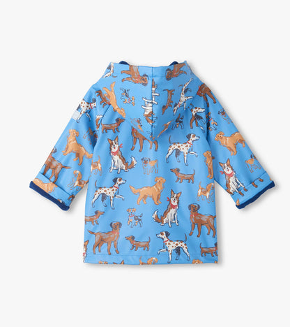 Back view of kids blue hooded rain coat with allover dog print and blue cuff lining