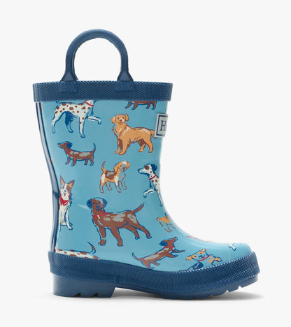 Single blue rain boot with navy handle and multicolor dog print, side view