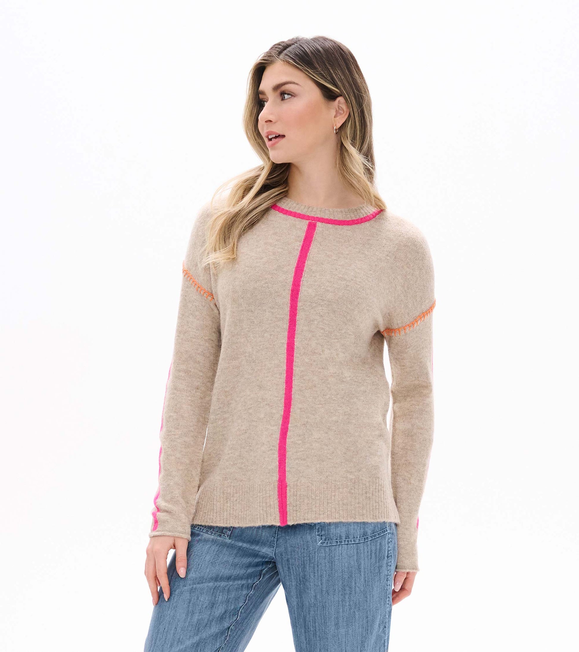 Front view of oatmeal sweater with neon pink trim, center seam detail, and sleeve stripes