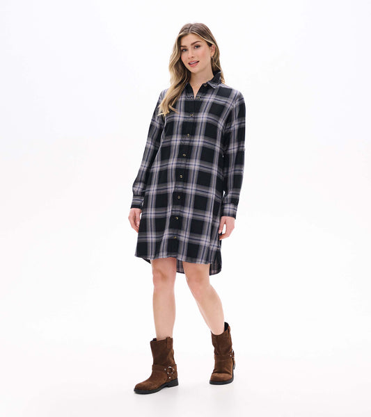 Front view of black and tan plaid shirt dress with collar, button front, long sleeves, and curved hem