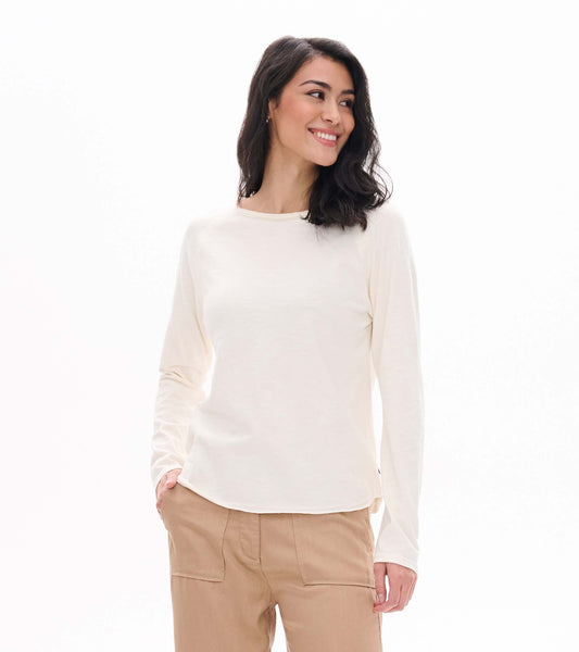 Front view of cream raglan sleeve tee with long sleeves and a wide crew neckline