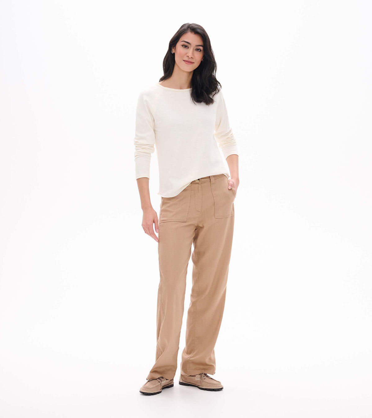 Front angled view of cream raglan sleeve tee with long sleeves and wide neckline