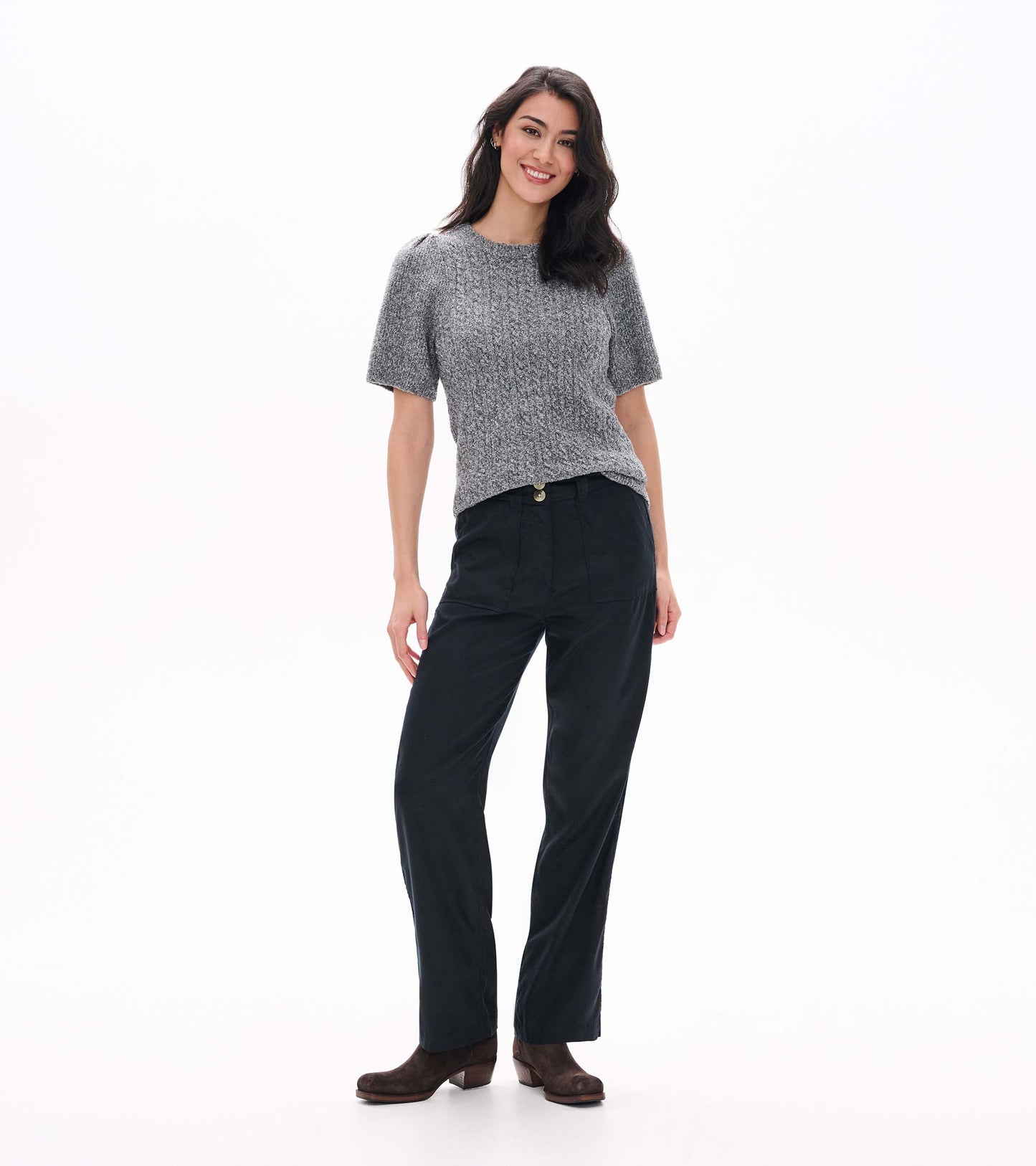 Black wide leg pants shown from the front on a model, with front buttons and patch pockets