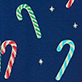 Three candy canes in red, green, and blue on a dark blue background with small stars