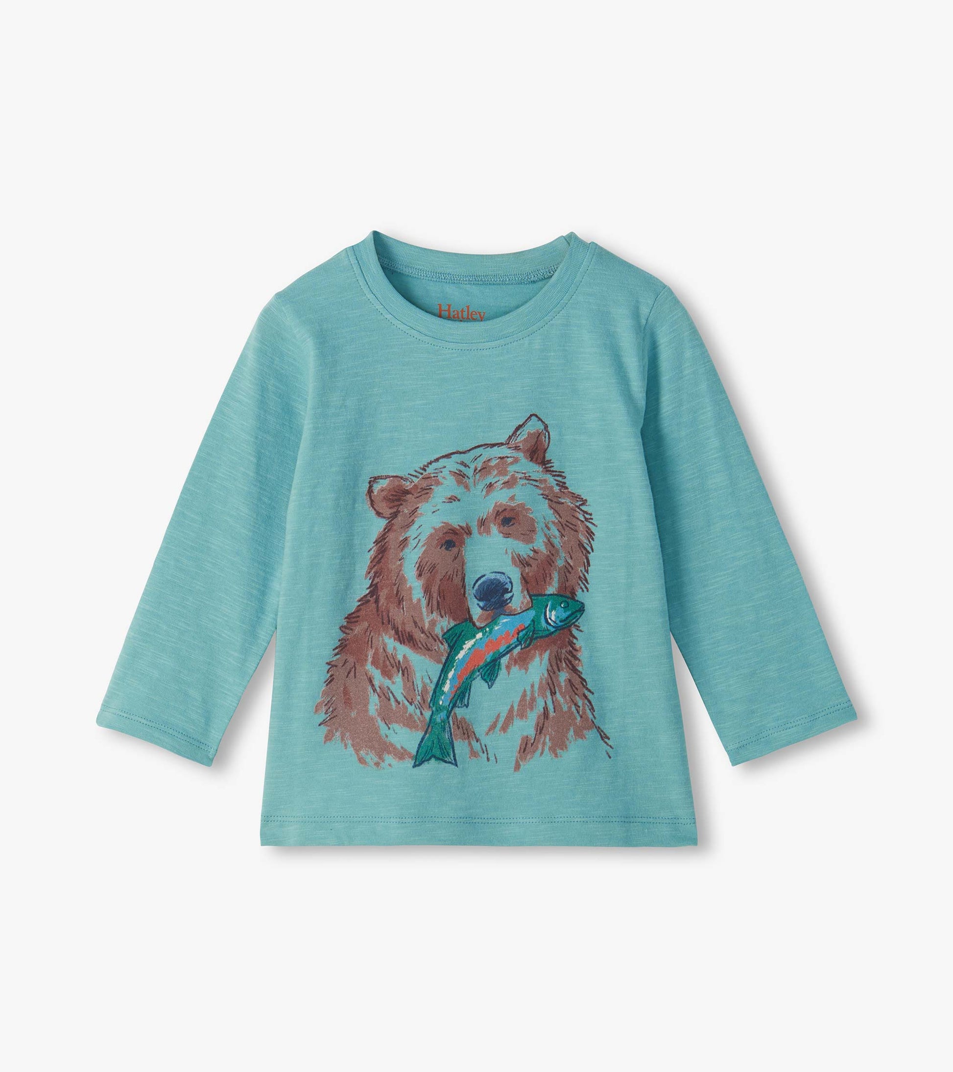 Turquoise long sleeve crew neck tee with a brown grizzly bear graphic holding a blue fish on the front