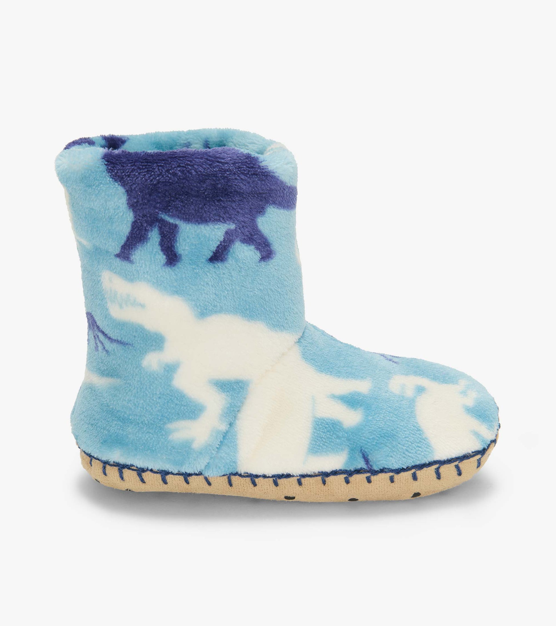 Side view of blue Dino Silhouette fleece slipper with white and navy dinosaur print