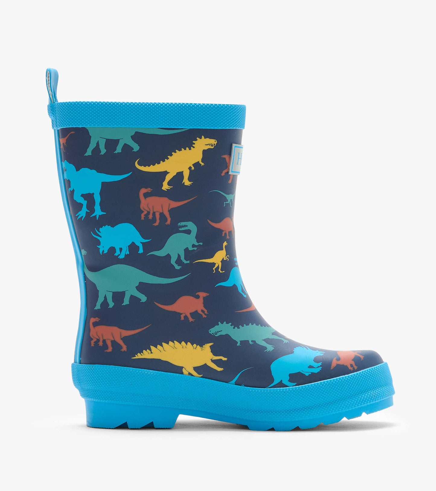 Side view of navy rain boot with colorful dinosaur print and bright blue sole and trim