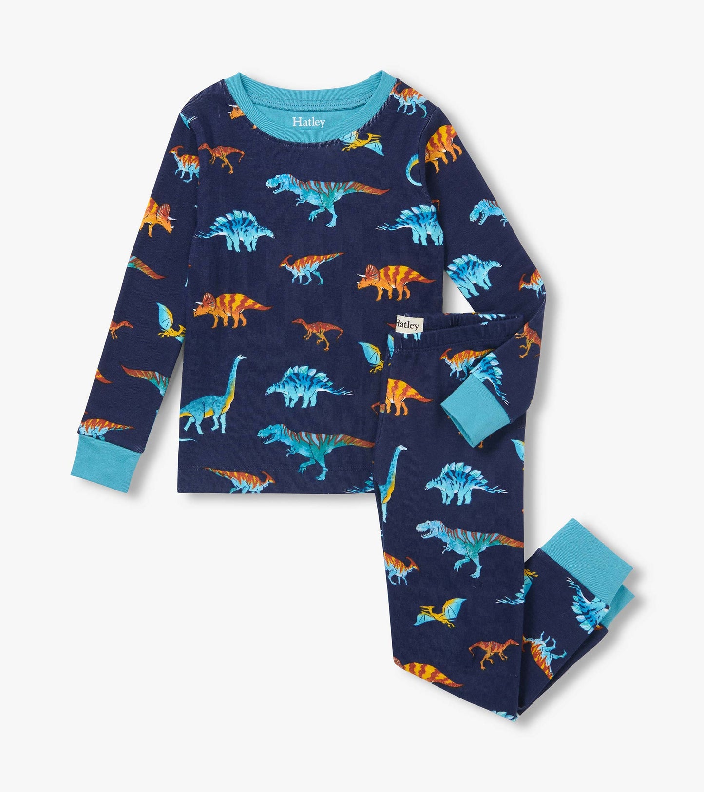 Kids pajama set in navy with colorful dinosaur print and bright blue neck, cuffs, and ankle bands
