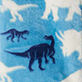 Blue and white abstract design with silhouettes of a wolf, a scorpion, and white polar bears