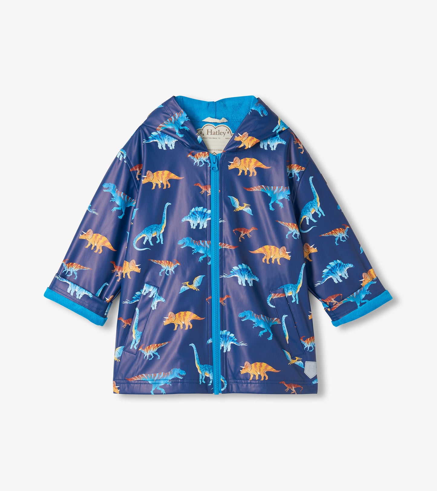 Front view of kids navy hooded rain coat with blue zip and colorful dinosaur print