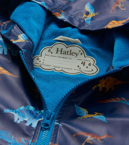 Close-up of bright blue lining, zipper and Hatley name tag inside dinosaur print rain coat