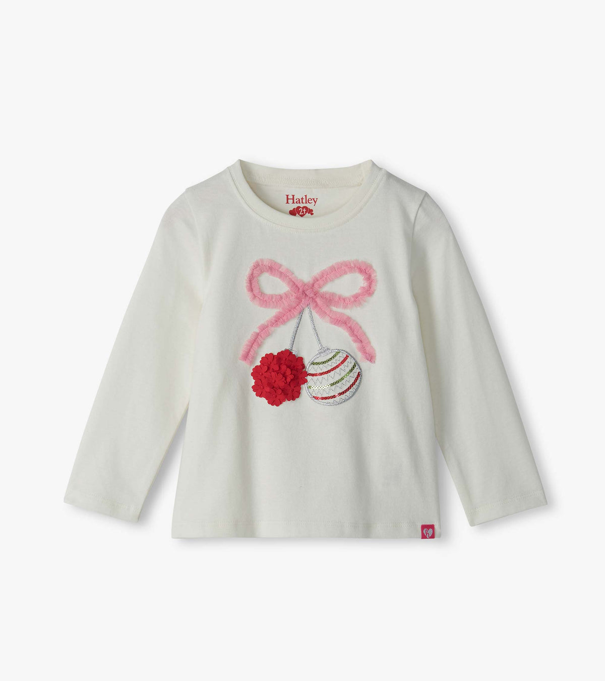Ivory long-sleeve toddler T-shirt with pink bow and hanging ornament chest graphic