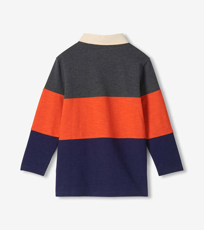 Back view of boys long-sleeve polo shirt with charcoal, orange and navy colourblock panels