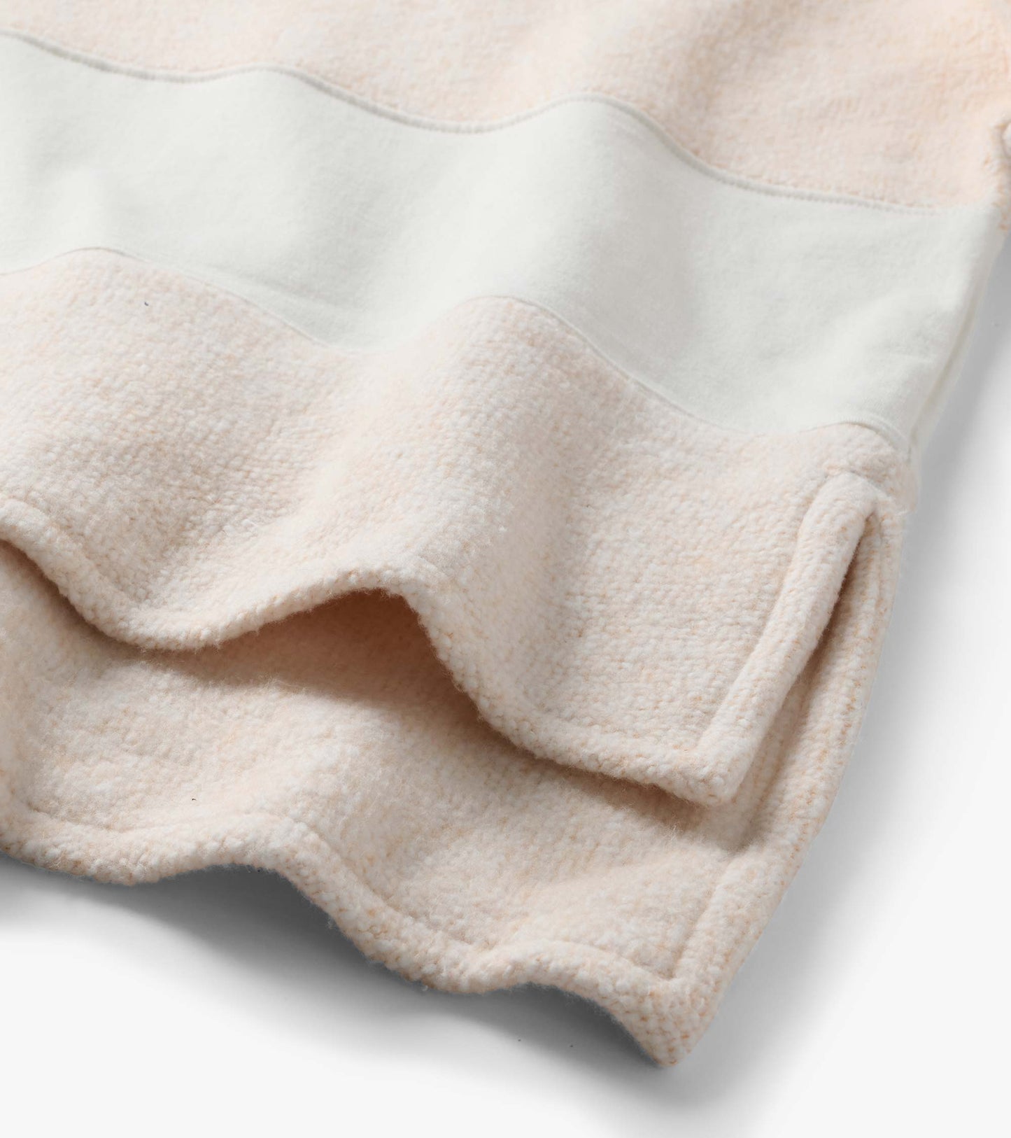 Close-up of the oatmeal top showing textured stripes and a smooth wavy horizontal panel