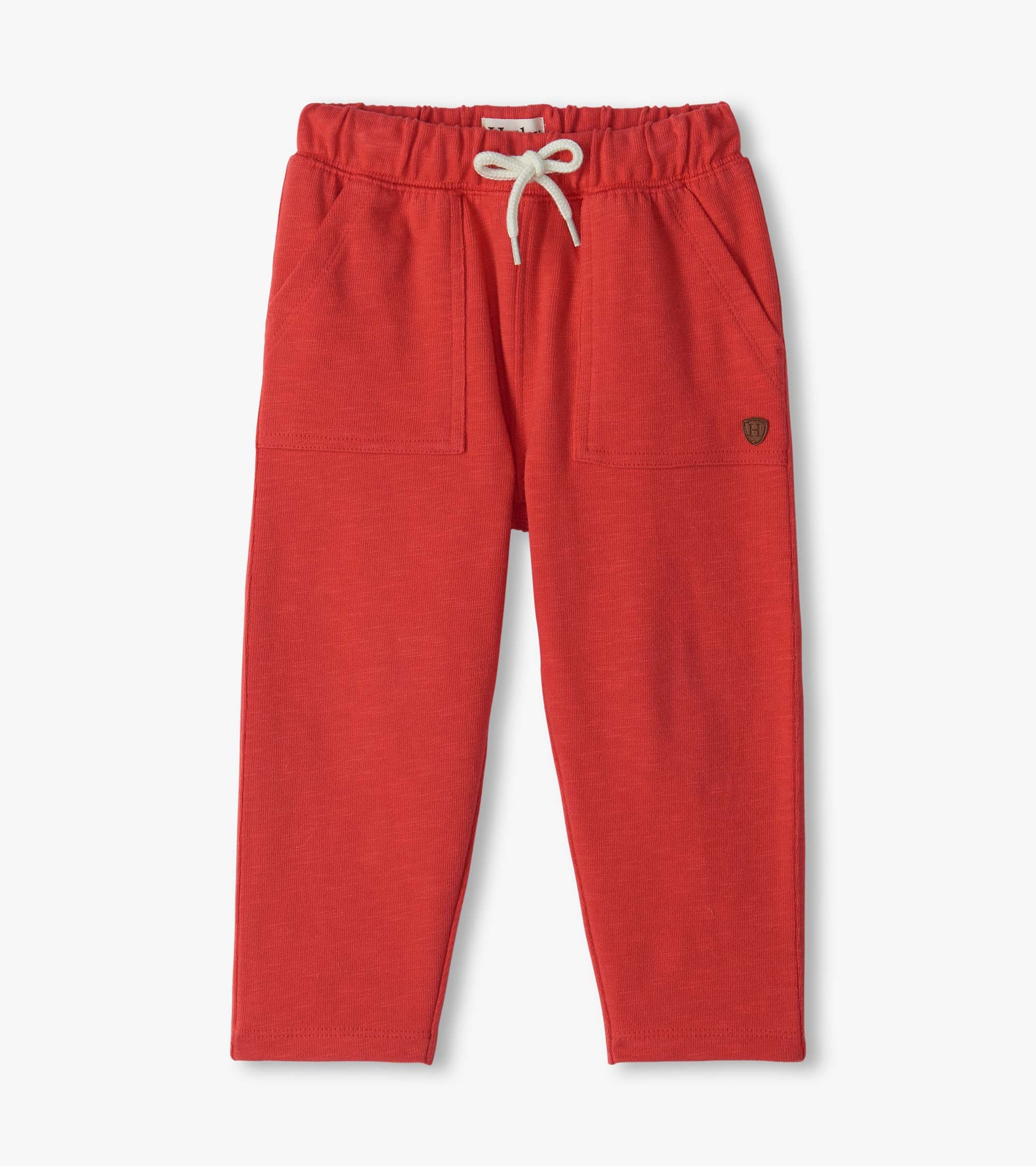 Infant pull-on pants in chrysanthemum red with elastic drawstring waist and front patch pockets