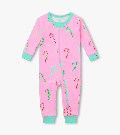 Front view of baby girls pink sleeper with candy cane print, mint trim, and full zip closure