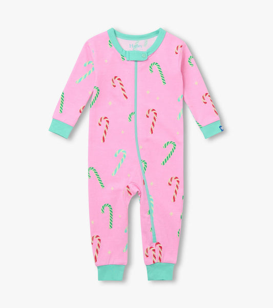 Front view of baby girls pink sleeper with candy cane print, mint trim, and full zip closure