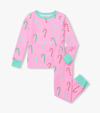 Girls pink pajama set with multicolor candy cane print, long-sleeve top, fitted pants, and mint cuffs